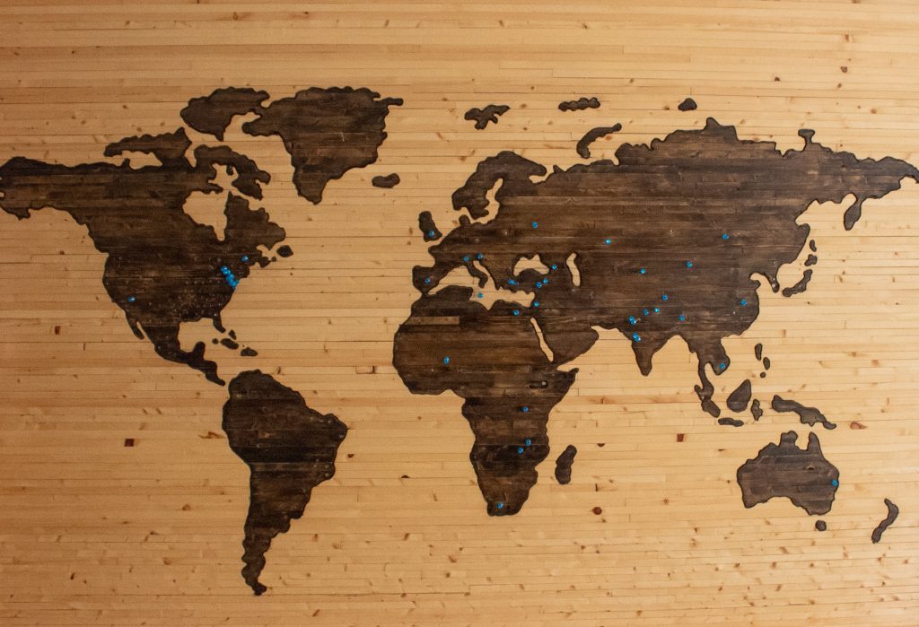 world map board with pins